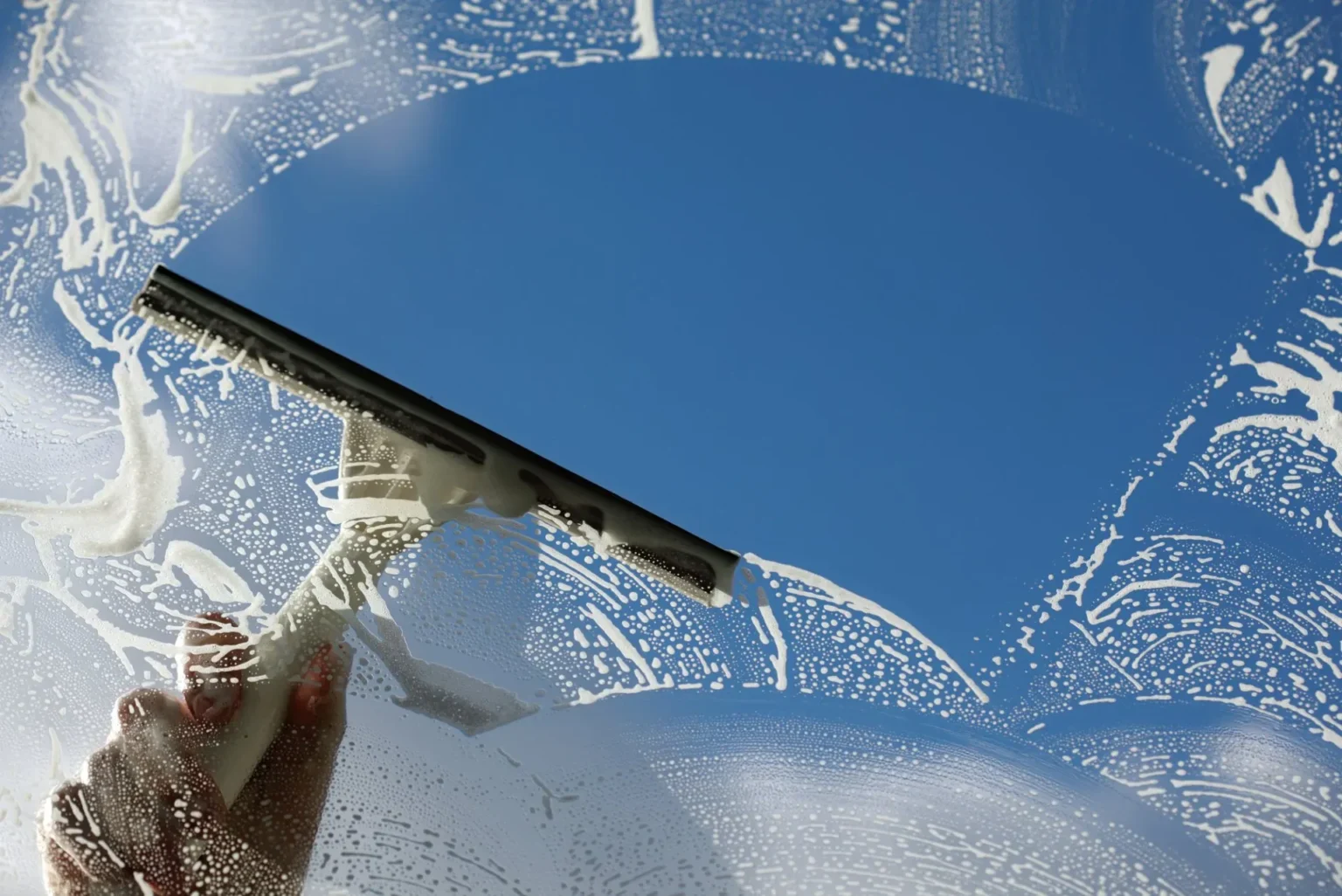 Squeegee Cleaning Glass